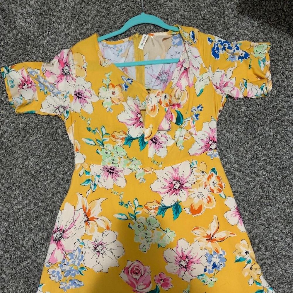 Yellow flower dress. Knee length